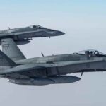 போர் விமானங்கள் புடைசூழ தரையிறங்கிய விமானங்கள் – மொன்றியலில் பரபரப்பு – இருவர் கைது!